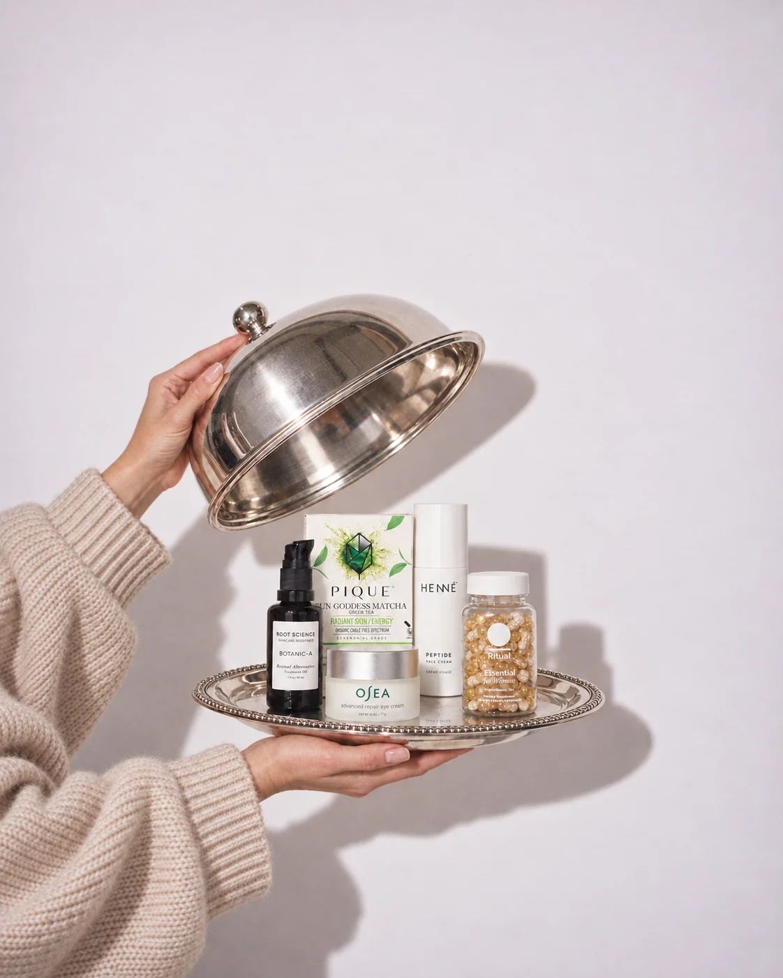 AÏA Approved products revealed under a silver cloche